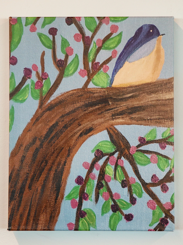 I chose to paint a bird in a tree because with my cochlear implant, I can now hear the birds singing and the ruffles of the trees when a light breeze is in the air. My hearing journey started at the age of five. By age 11, I got my first pair of hearing aids where for the first time I could hear a simple car running. Unfortunately, my hearing would continue to deteriorate and my hearing aids would continue to be a stronger model. I was 46 when I got my first cochlear implant and oh wow, I was hearing sounds I never imagined hearing. It was almost overwhelming! I love my cochlear!