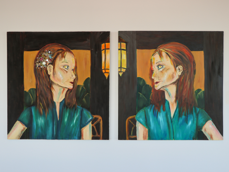 I created this diptych shortly after I received my first cochlear implant in 2006. It is a self-portrait of sorts, with my implanted and 
                                        un-implanted selves facing each other from different canvases. I like to think they look upon each other with acceptance and understanding that they are two halves of the same whole. I call this piece, “Turning a Deaf Ear.”