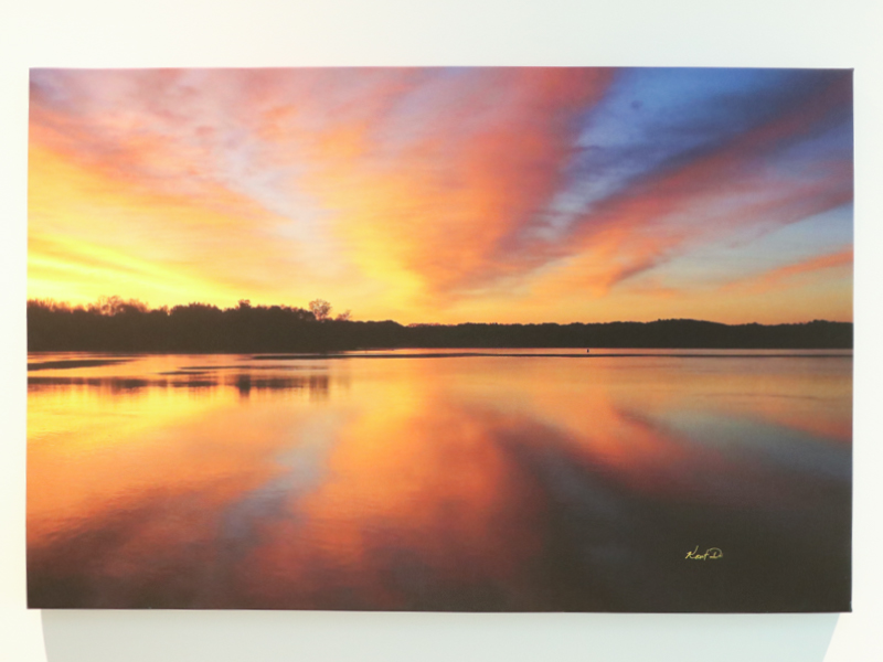 From Quiet Dawn to the Awakening to Nature’s Orchestra - Before my Cochlear implant, I would go down from our cabin to a rocky overhang on the Tennessee River to photograph the dawning of a new day. It was quiet, not a sound could I hear. After I had my Cochlear implant, I would go again to the rocky overhang to photograph the sunrise. I realized as I sat there that I could hear nature’s orchestra awakening. The first breeze of the day would cause the sound of small waves lapping against the rocks beneath me. Then, the rustling leaves and the pines sighing as the breeze woke them. The first notes of harmony from the song birds and the beating drum of the woodpecker deep in the woods seeking breakfast; the snort of the deer to its mate or off-spring to let them know man was in the area. I did not know what a remarkable performance of nature’s orchestra I had around me, as I was viewing my quiet dawn. What a special memorable experience. To regain the performance of nature’s sounds because of my Cochlear implant brings joy to my world of a quiet dawn. Silence is Golden; however, I would never want to go back to my hearing before my Cochlear implant. Thank you, I’m grateful.