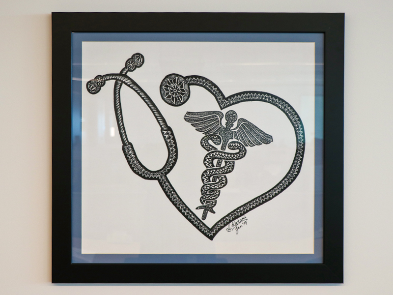 My artwork portrays a medical logo surrounded by a stethoscope in the form of art called zentangles. In the audiology program, I have learned how important it is to involve the entire medical team to treat patients from a multi-dimensional, holistic point of view. Hence, the artwork tries to signify that the patient is medically protected under whichever doctor they choose to go because this is what our profession is designed to do; to make them feel safe about themselves, no matter their diagnoses.